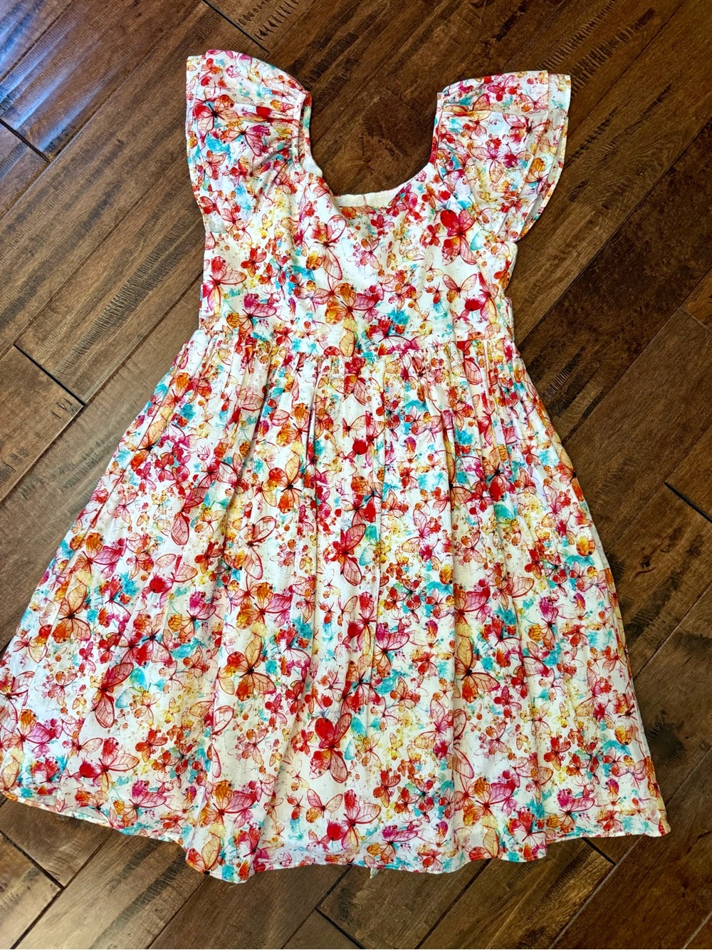 Pippa & Julie White Dress with Red, Orange, Aqua Floral & Butterfly Print